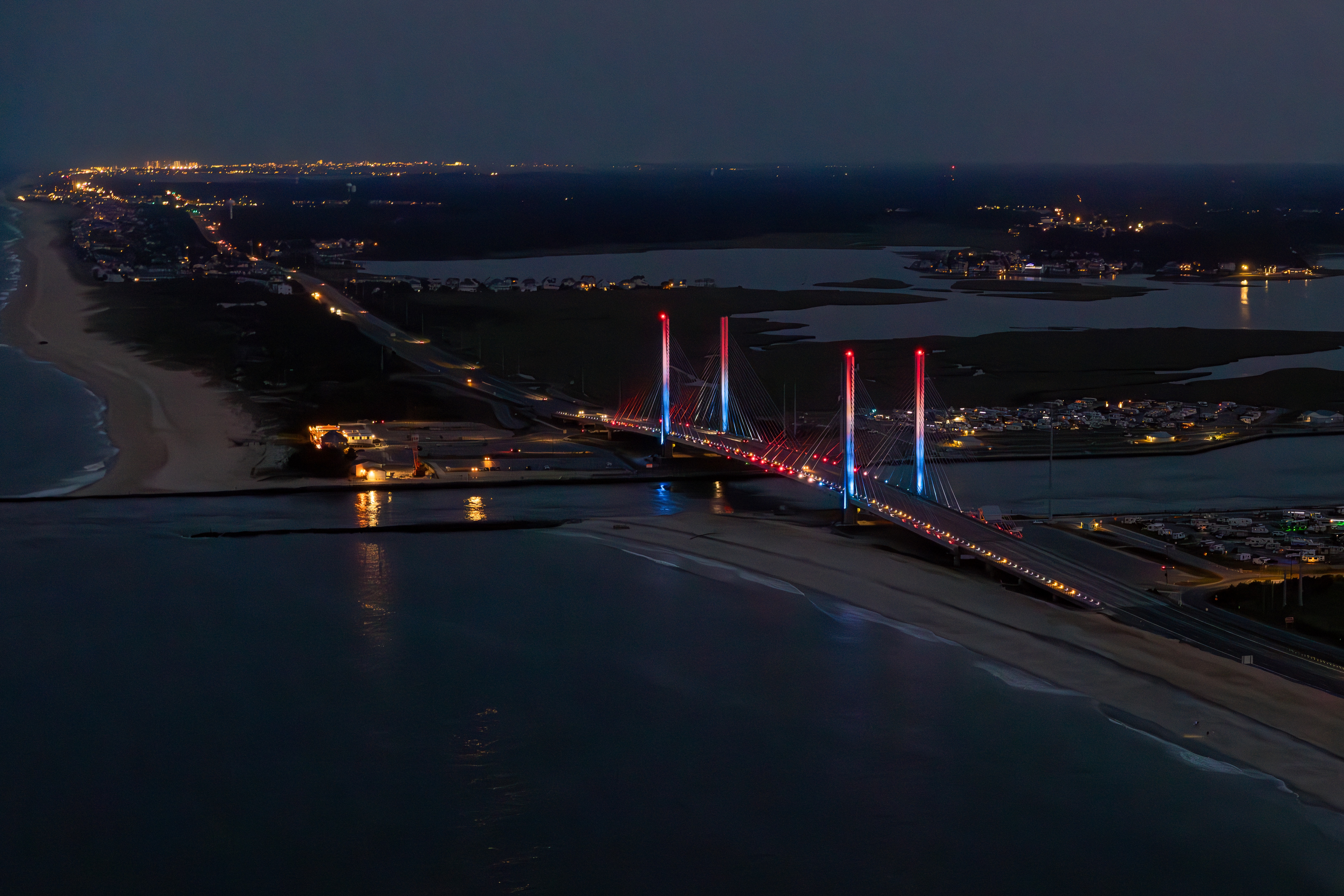 bridge at night with the inlet in view